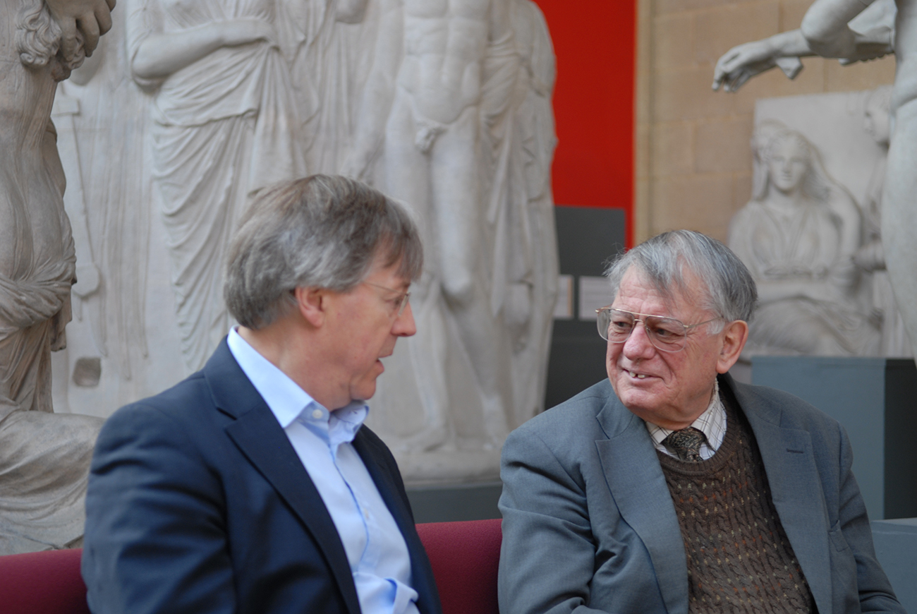 Prof. Paul Cartledge and Prof. Malcolm Schofield in conversation with Max Kramer's image